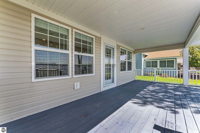 3151 W Lake Mitchell Dr, Cadillac, MI 49601 - view of wooden terrace