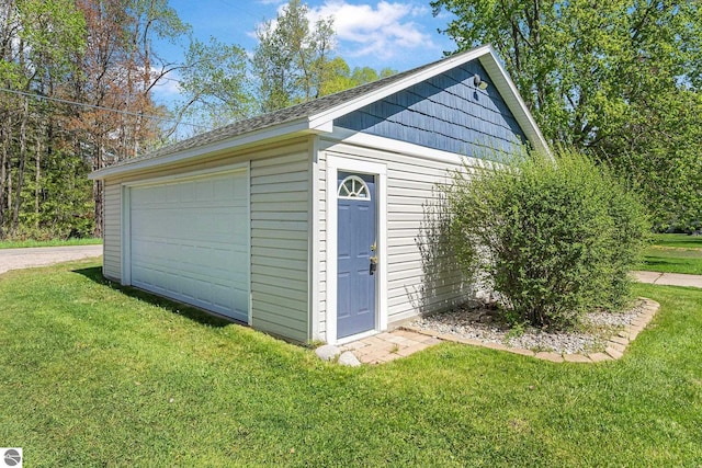 3151 W Lake Mitchell Dr, Cadillac, MI 49601 - view of detached garage