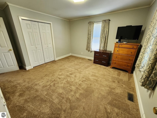 6878 Boss Rd, Ellsworth, MI 49727 - unfurnished bedroom with light carpet, crown molding, a closet, and baseboards