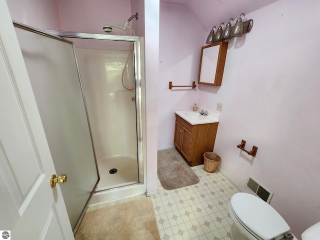 6878 Boss Rd, Ellsworth, MI 49727 - full bath with a shower stall, toilet, vanity, baseboards, and lofted ceiling