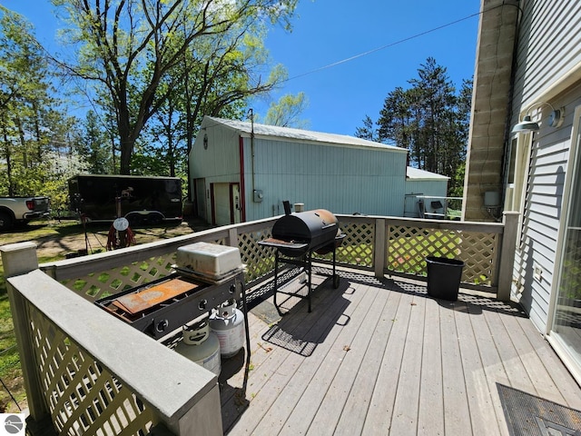 6878 Boss Rd, Ellsworth, MI 49727 - deck with grilling area
