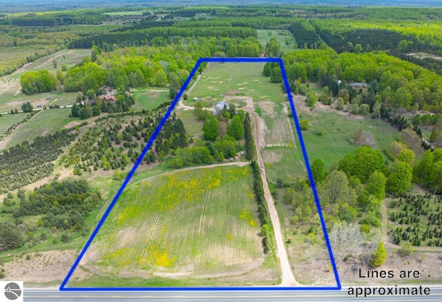 8281 M-66, Fife Lake, MI 49633 - overview of rural landscape featuring property boundaries highlighted