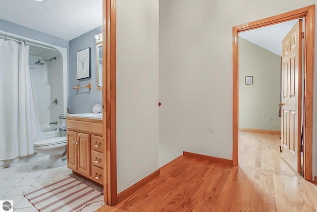 8281 M-66, Fife Lake, MI 49633 - hallway with light wood-style flooring and baseboards