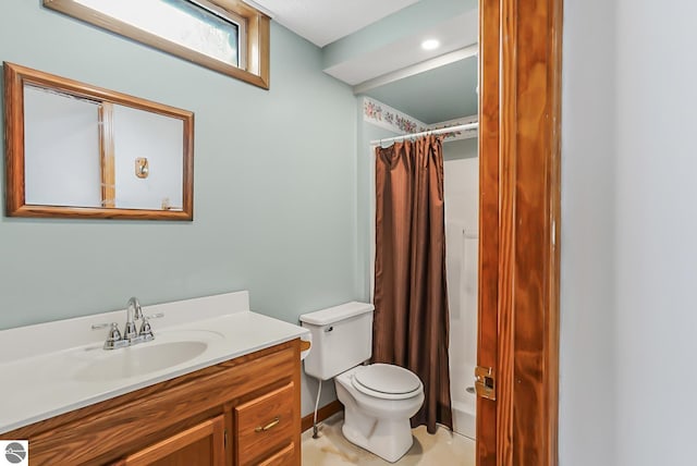 8281 M-66, Fife Lake, MI 49633 - bathroom with vanity, a shower with shower curtain, and toilet