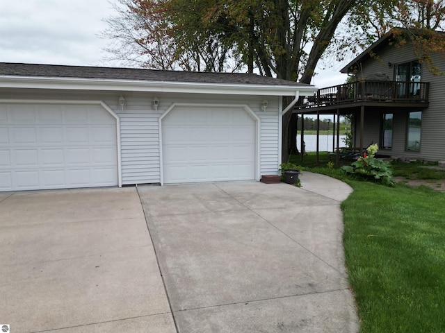 1094 Fairway Dr, Lake Isabella, MI 48893 - garage featuring concrete driveway
