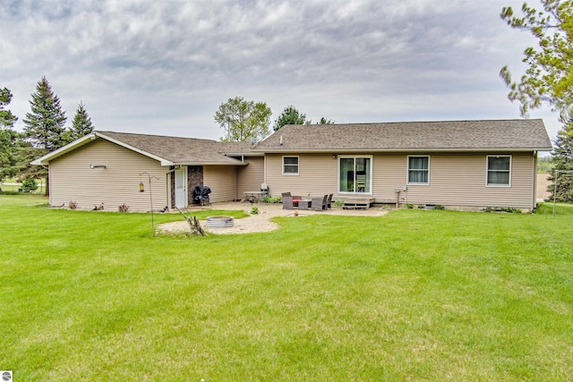 605 E M-55, West Branch, MI 48661 - rear view of property featuring an outdoor fire pit, a lawn, and a patio