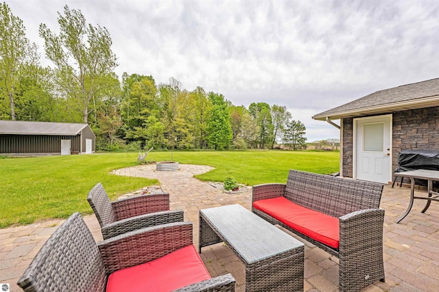 605 E M-55, West Branch, MI 48661 - view of patio featuring an outdoor hangout area