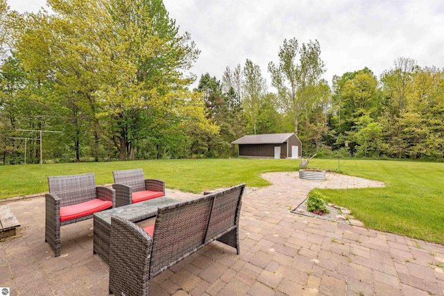 605 E M-55, West Branch, MI 48661 - view of patio featuring an outdoor structure