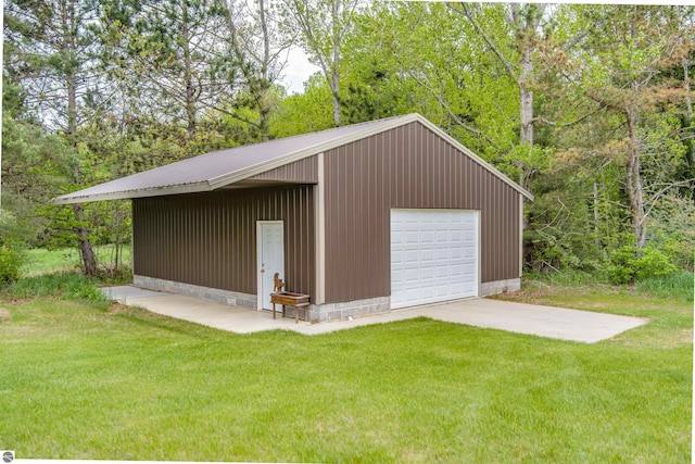 605 E M-55, West Branch, MI 48661 - view of outdoor structure with driveway