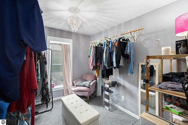 832 Wallace St, Cadillac, MI 49601 - spacious closet with carpet flooring and a chandelier