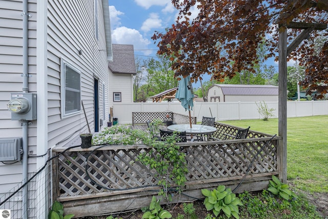 832 Wallace St, Cadillac, MI 49601 - wooden terrace featuring outdoor dining space