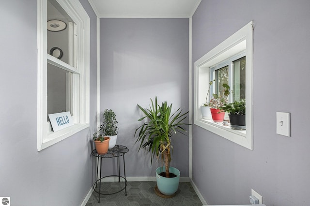832 Wallace St, Cadillac, MI 49601 - hallway featuring baseboards and crown molding