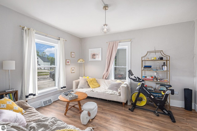 832 Wallace St, Cadillac, MI 49601 - living room with wood finished floors and baseboards