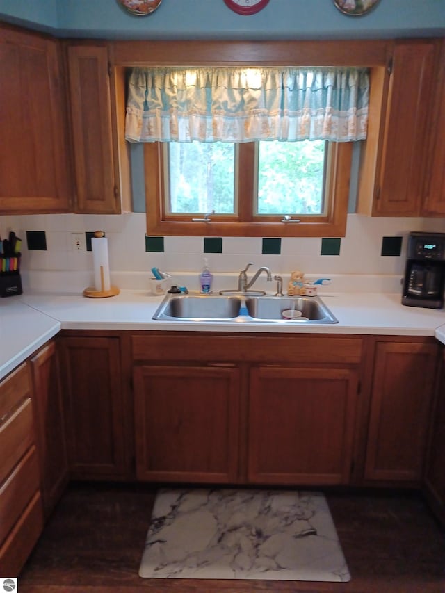 4440 M-65, Oscoda, MI 48750 - kitchen with a sink, light countertops, healthy amount of natural light, and backsplash