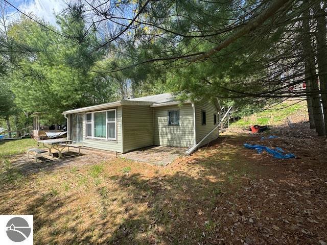 951 Lake Dr, Harrison, MI 48625 - view of back of house