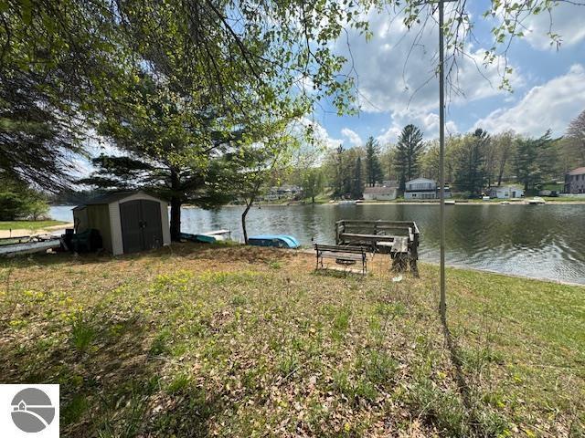951 Lake Dr, Harrison, MI 48625 - dock featuring a water view