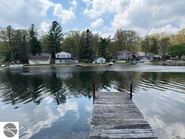 951 Lake Dr, Harrison, MI 48625 - dock featuring a water view