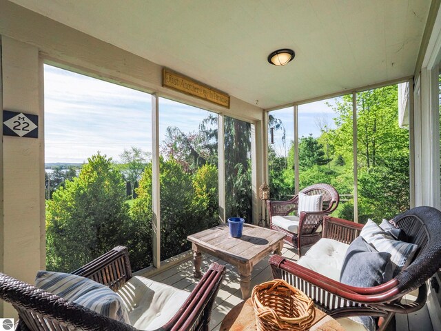 1321 N Manitou Trl, Leland, MI 49654 - sunroom / solarium with an outdoor hangout area and plenty of natural light