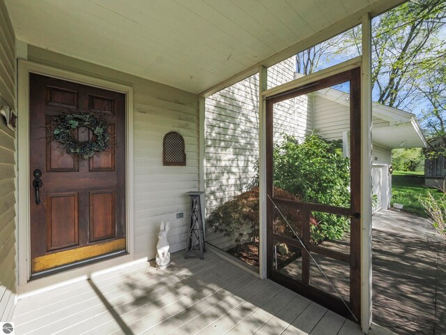 1321 N Manitou Trl, Leland, MI 49654 - property entrance with covered porch