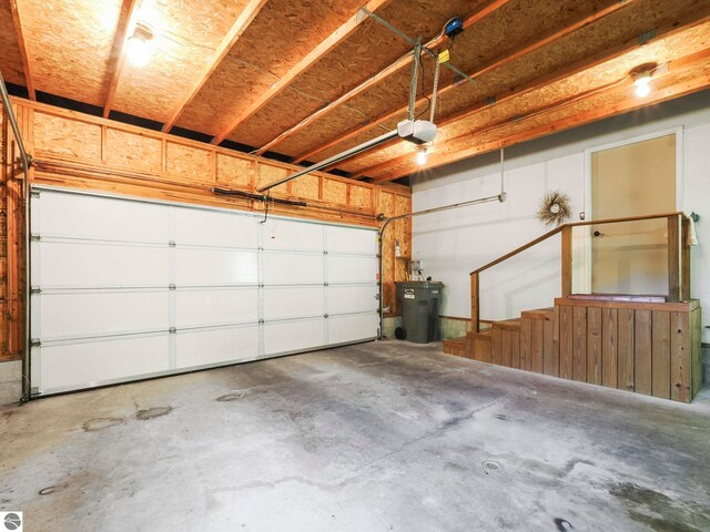 1321 N Manitou Trl, Leland, MI 49654 - garage with a garage door opener