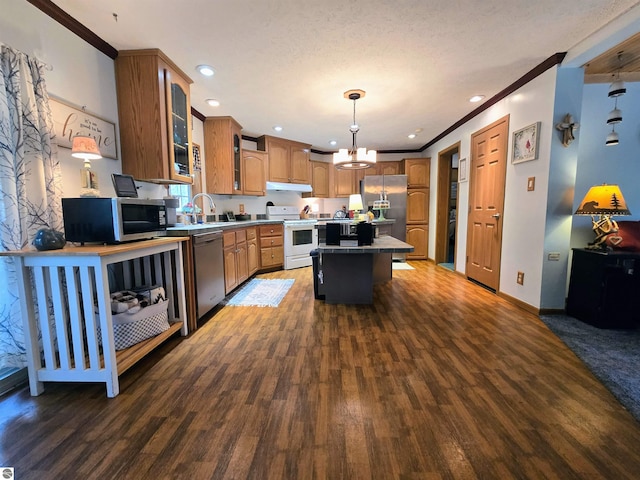 1470 N Al Moses Rd, Lake City, MI 49651 - kitchen with appliances with stainless steel finishes, under cabinet range hood, wood finished floors, crown molding, and a kitchen island