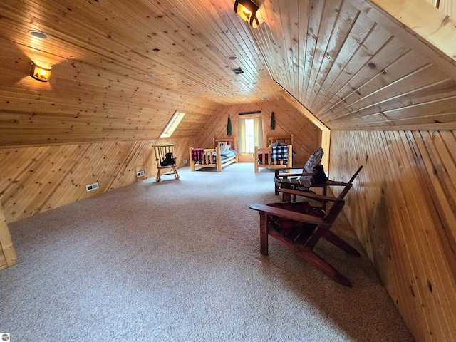 1470 N Al Moses Rd, Lake City, MI 49651 - bonus room featuring wood walls, vaulted ceiling, wooden ceiling, and carpet flooring