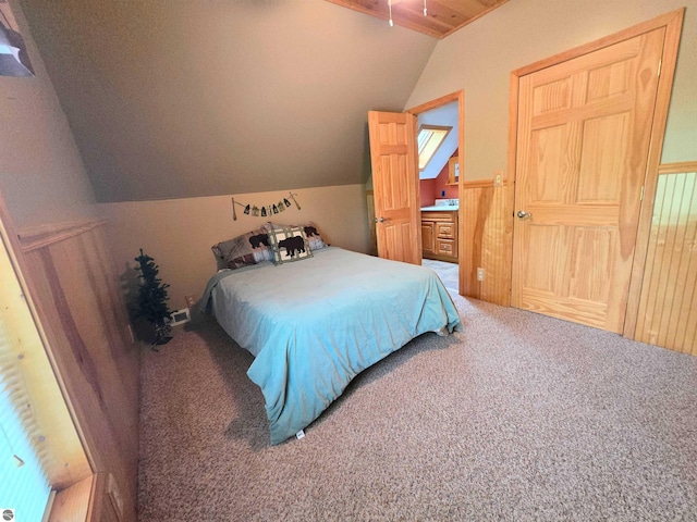 1470 N Al Moses Rd, Lake City, MI 49651 - bedroom featuring lofted ceiling, carpet floors, and wainscoting