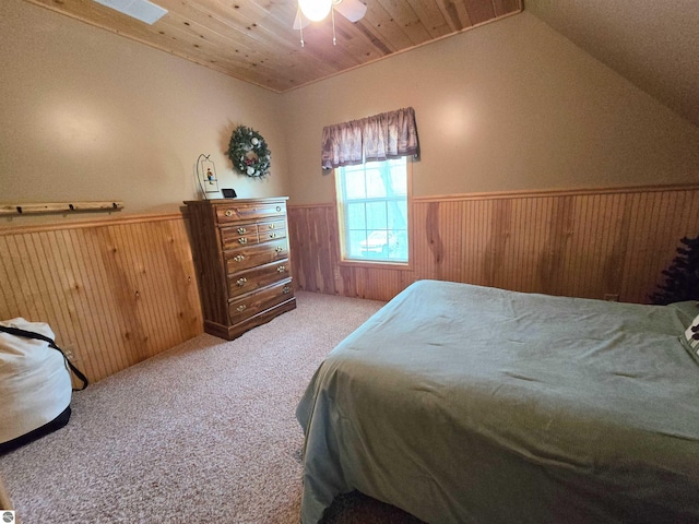 1470 N Al Moses Rd, Lake City, MI 49651 - bedroom featuring a wainscoted wall, wooden walls, carpet flooring, vaulted ceiling, and wooden ceiling