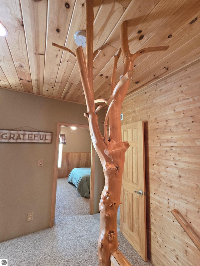 1470 N Al Moses Rd, Lake City, MI 49651 - carpeted bedroom featuring wooden walls and wooden ceiling