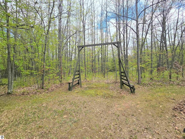 1470 N Al Moses Rd, Lake City, MI 49651 - view of yard featuring a wooded view