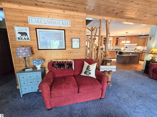 1470 N Al Moses Rd, Lake City, MI 49651 - living area featuring carpet floors and wood walls