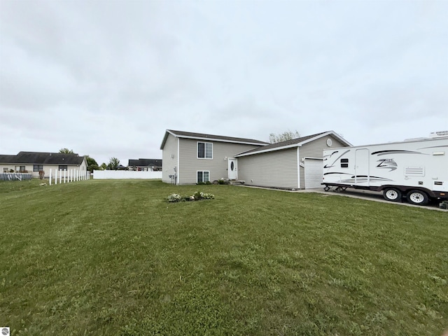 2442 Joseph Dr, Mount Pleasant, MI 48858 - view of property exterior featuring an attached garage