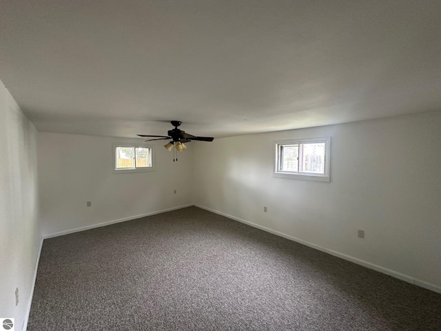 1007 Park St, Mount Pleasant, MI 48858 - unfurnished room featuring ceiling fan, carpet floors, and baseboards