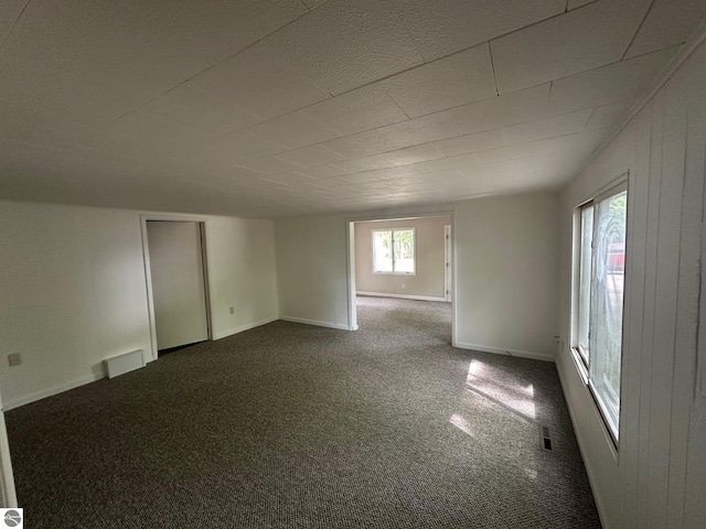 1007 Park St, Mount Pleasant, MI 48858 - unfurnished room featuring carpet flooring and baseboards