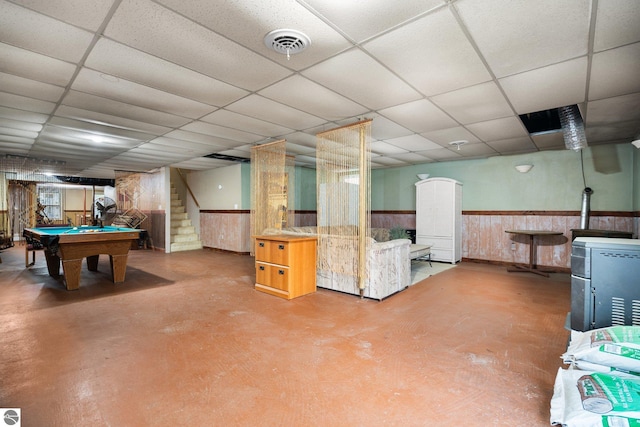 11567 Lake Valley Rd, Kalkaska, MI 49646 - finished basement featuring wainscoting, a drop ceiling, pool table, stairway, and wooden walls