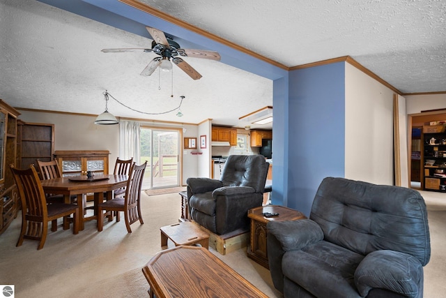 11567 Lake Valley Rd, Kalkaska, MI 49646 - living area with light colored carpet, crown molding, a textured ceiling, and a ceiling fan