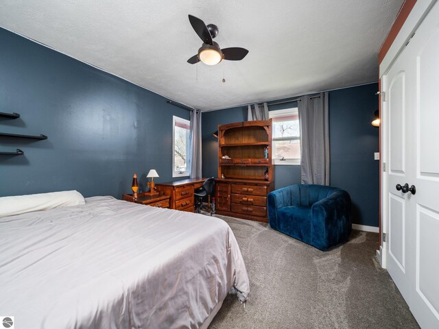 855 E State St, Traverse City, MI 49686 - carpeted bedroom with a ceiling fan