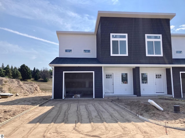 9286 S Flaska Dr Unit 12, Cedar, MI 49621 - view of front of home featuring driveway