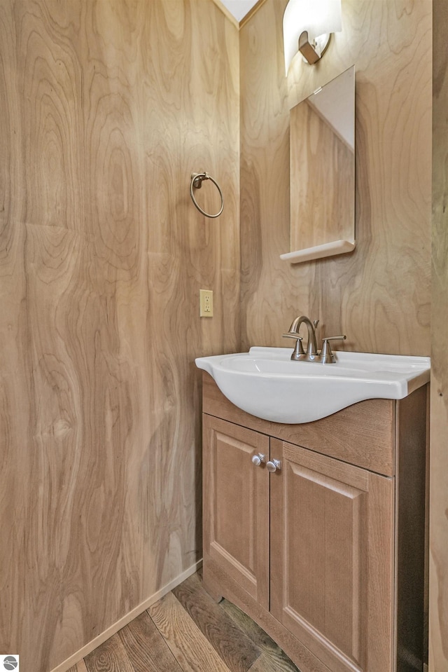 145 Fisher Rd, Traverse City, MI 49685 - bathroom featuring vanity and wood finished floors
