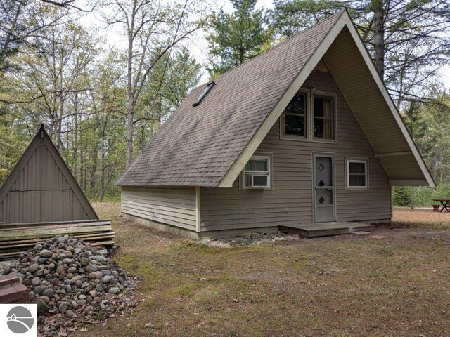 7117 Grove, South Branch, MI 48761 - view of front of home with roof with shingles