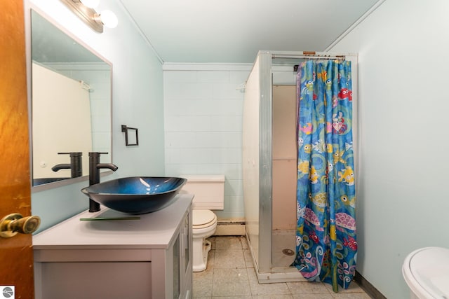 6770 N Crystal, Vestaburg, MI 48891 - bathroom with toilet, a stall shower, vanity, crown molding, and baseboard heating