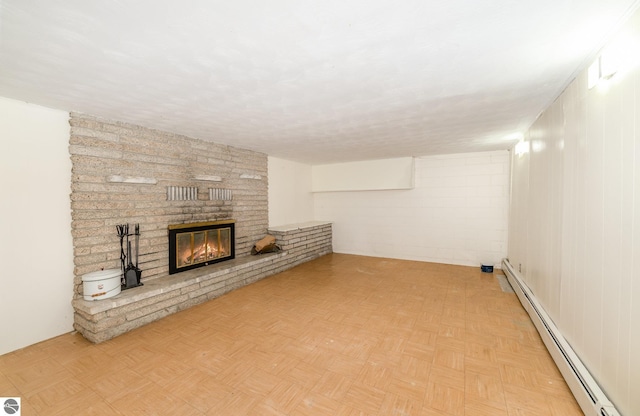 6770 N Crystal, Vestaburg, MI 48891 - unfurnished living room featuring a baseboard radiator and a fireplace
