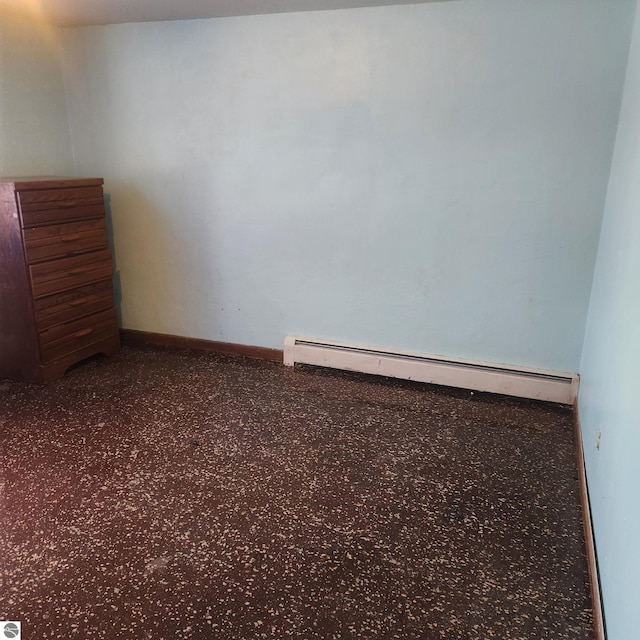6770 N Crystal, Vestaburg, MI 48891 - carpeted empty room featuring baseboard heating and baseboards