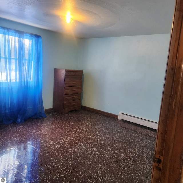 6770 N Crystal, Vestaburg, MI 48891 - empty room featuring baseboard heating and baseboards