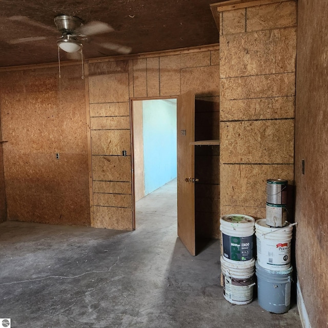 6770 N Crystal, Vestaburg, MI 48891 - misc room featuring a ceiling fan and unfinished concrete floors