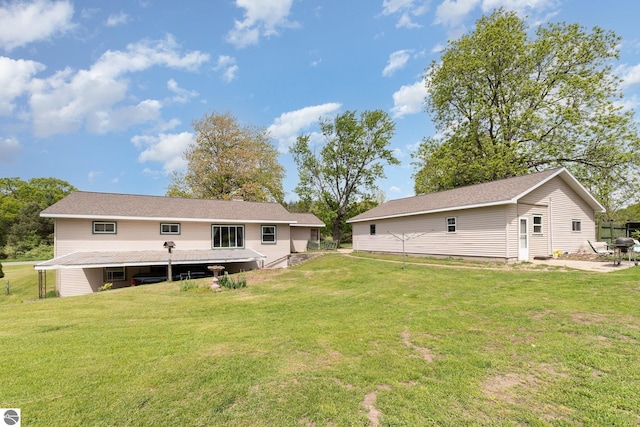 6770 N Crystal, Vestaburg, MI 48891 - back of property with a yard, a patio, and an outdoor structure