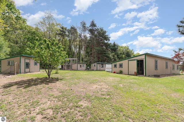 6770 N Crystal, Vestaburg, MI 48891 - view of grassy yard with an outdoor structure