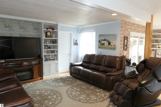 505 Eaton St, Breckenridge, MI 48615 - living room with plenty of natural light, crown molding, built in shelves, wood finished floors, and a glass covered fireplace