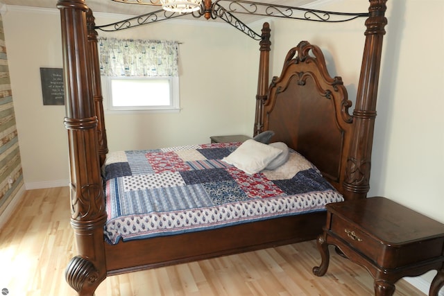 505 Eaton St, Breckenridge, MI 48615 - bedroom featuring wood finished floors and baseboards
