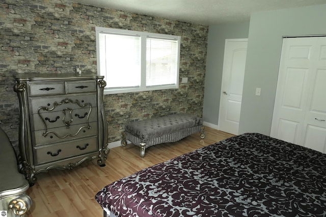 505 Eaton St, Breckenridge, MI 48615 - bedroom featuring light wood-style flooring and baseboards